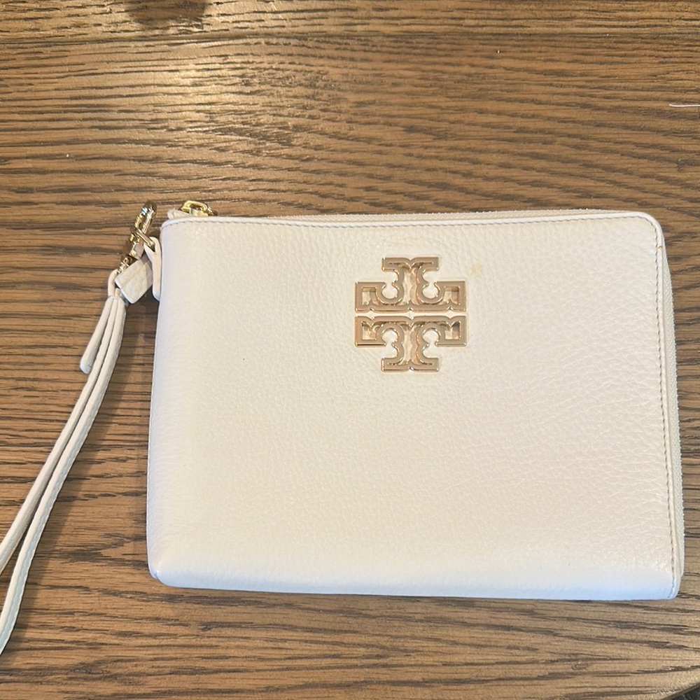Tory Burch Ivory Wristlet with Gold Logo. Never used, no flaws.